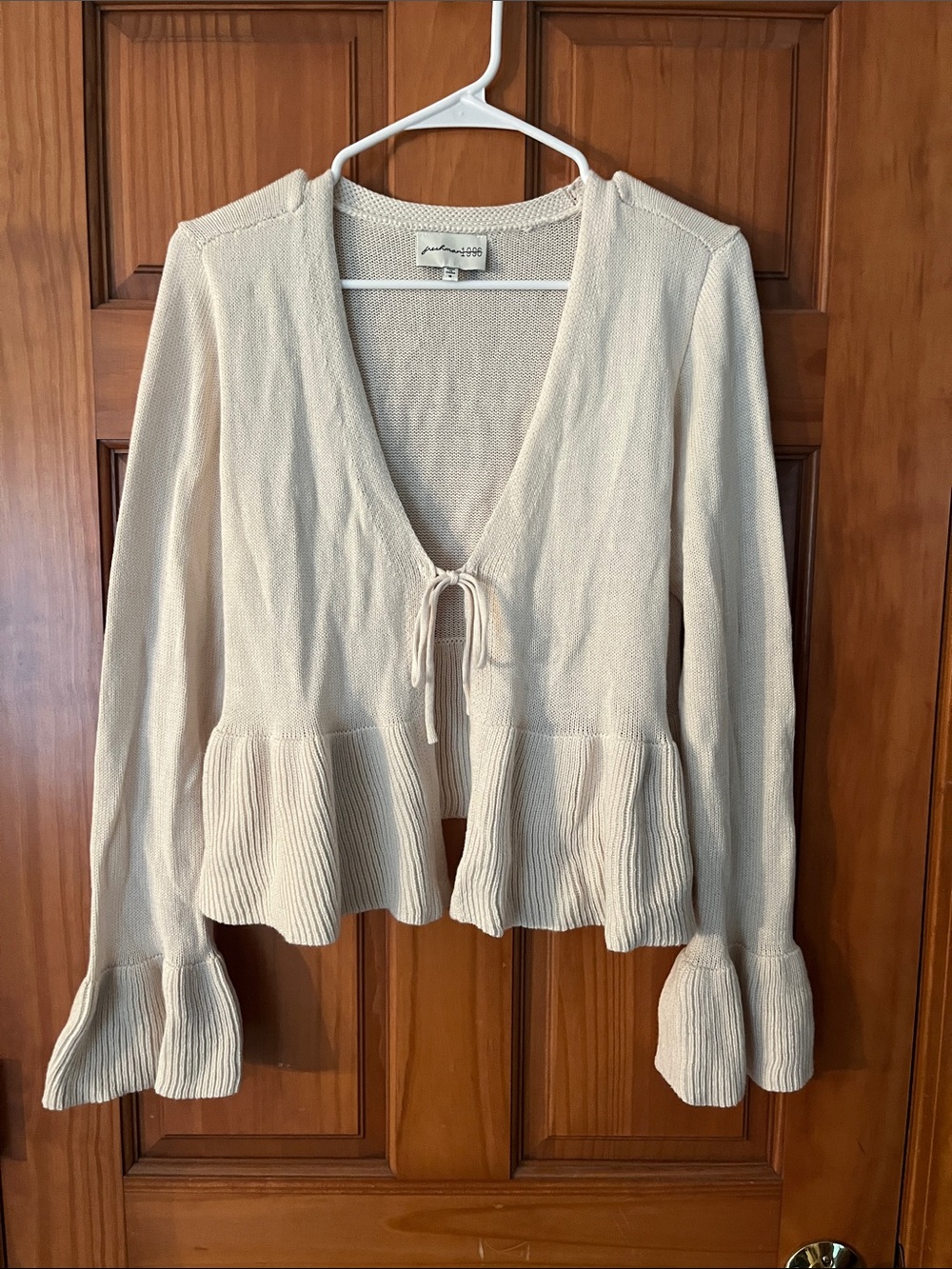 Tie-Front Ruffle Hem Cardigan Sweater in Light Cream